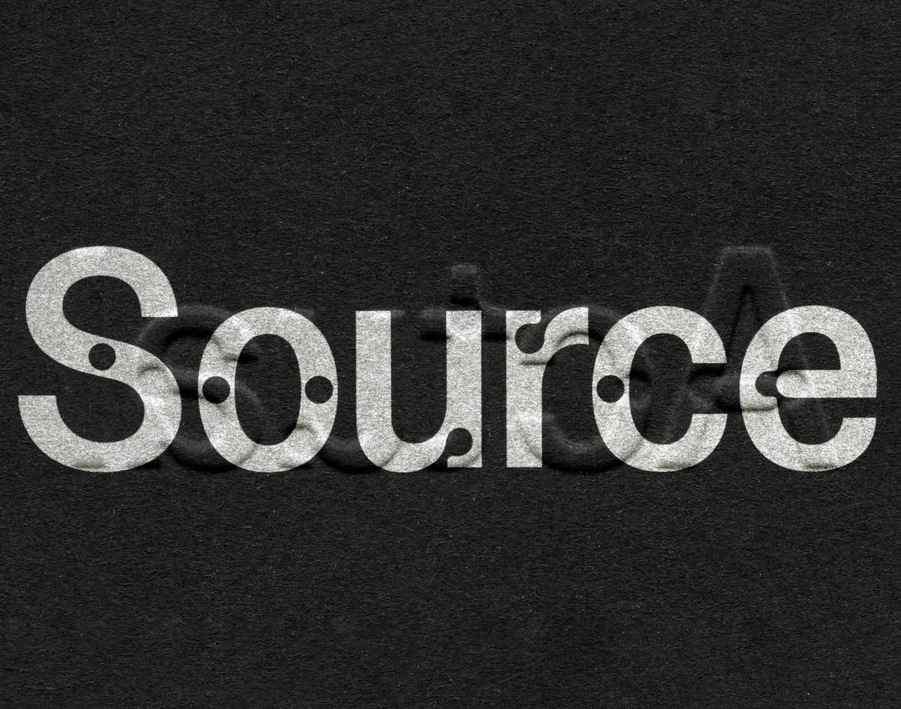 The word 'Source' written in a textured, white serif font on a dark grey background.