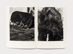 Interior spread of a photography book featuring two black and white images.