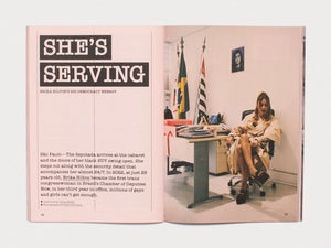 Interior spread from 'SHE'S SERVING' featuring a portrait of Erika Hilton in an office setting.
