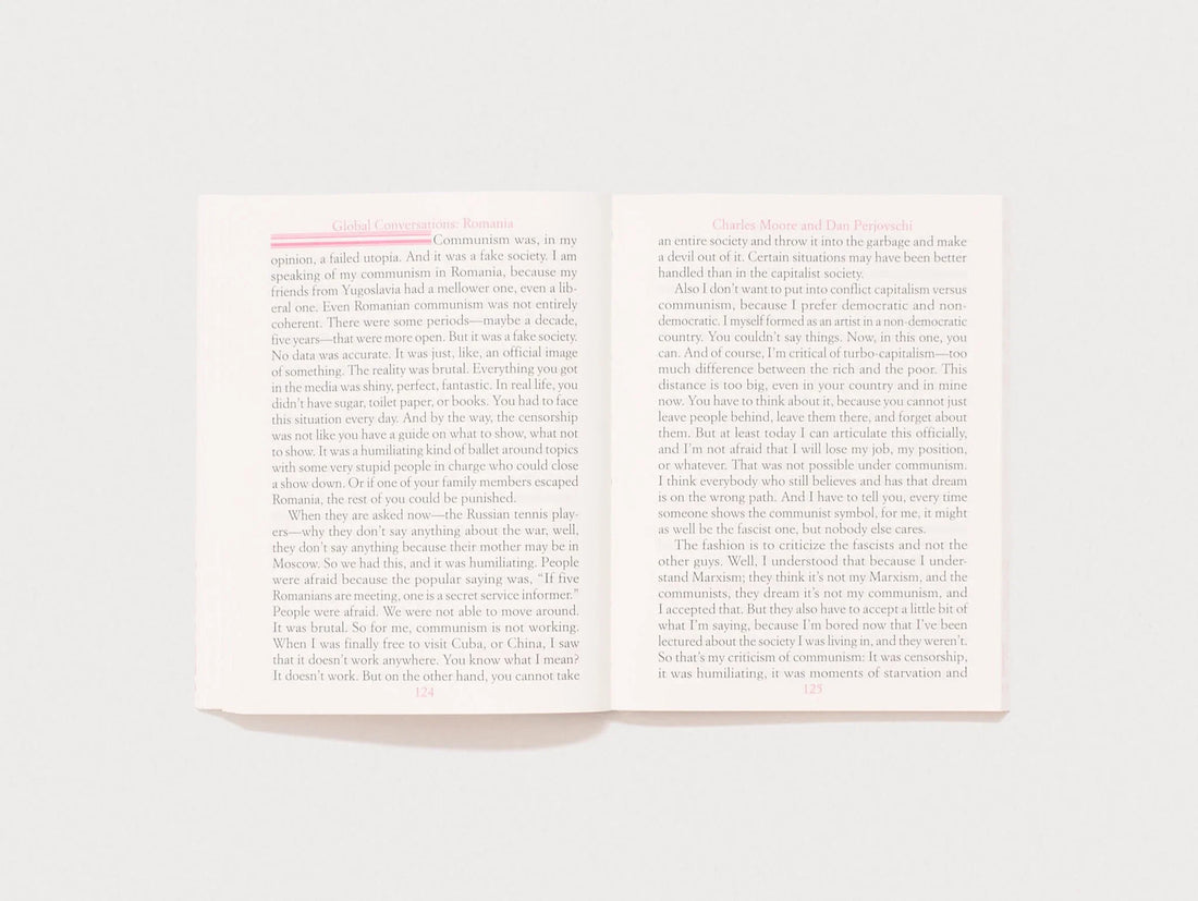 Interior spread from a book featuring text about communism in Romania.