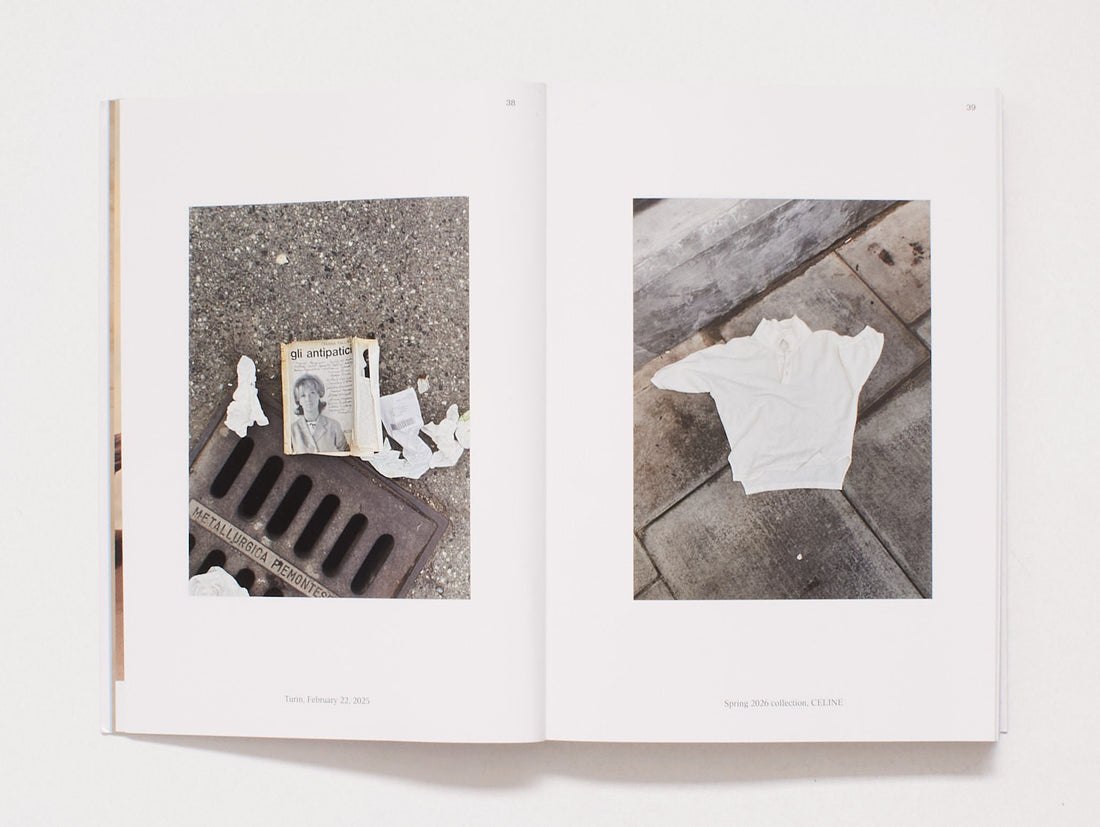 Interior spread from a photography book featuring found objects on city pavement.