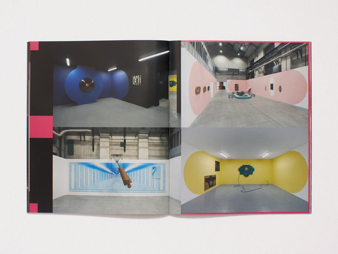 Interior spread from an art book featuring photographs of colorful installation art.