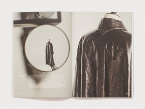 Interior spread featuring photography of textured leather garments.
