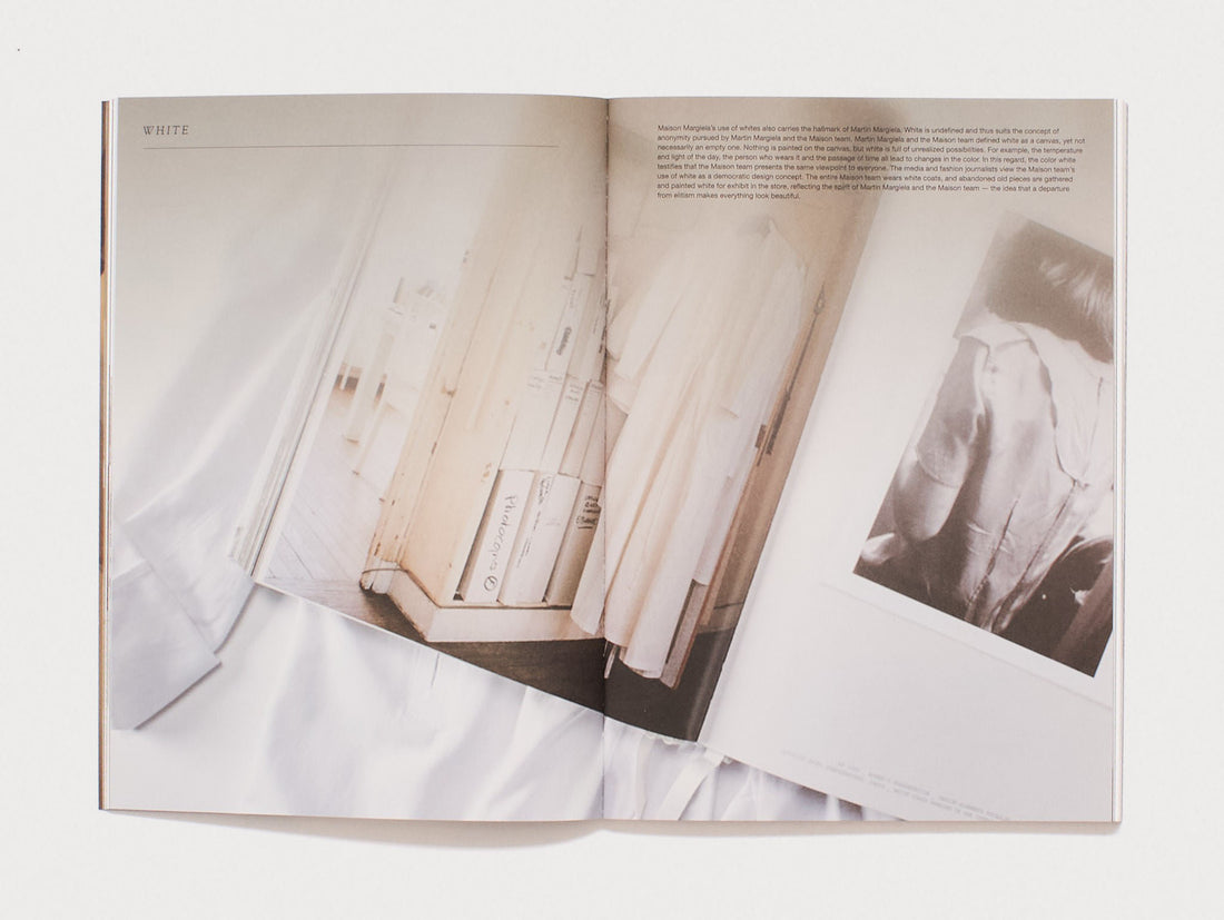 Interior spread from 'WHITE' featuring monochrome photography and text.