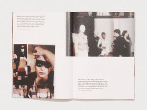 Interior spread from a book featuring halftone photography and text about Mr. Margiela.