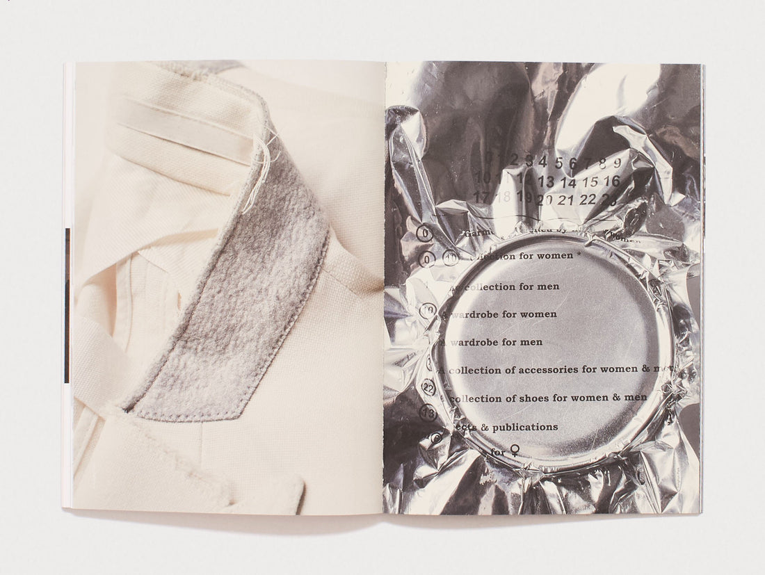 Interior spread from a design book featuring textile photography and a silver reflective element.