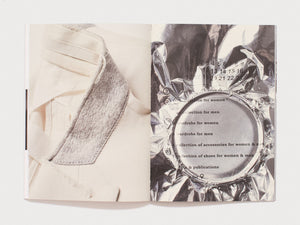 Interior spread from a design book featuring textile photography and a silver reflective element.