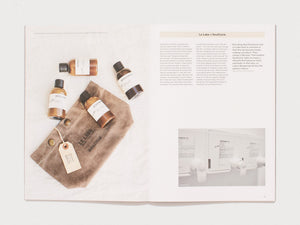 Interior spread from a book showcasing the Le Labo x SoulCycle collaboration.