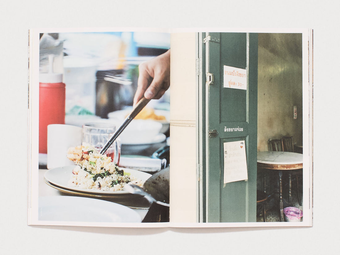 Interior spread from a photography book showing a hand serving food and a green door.