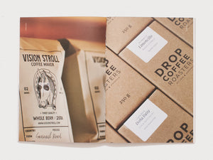Interior spread showing coffee packaging design with 'Vision Stroll' and 'Drop Coffee Roasters'