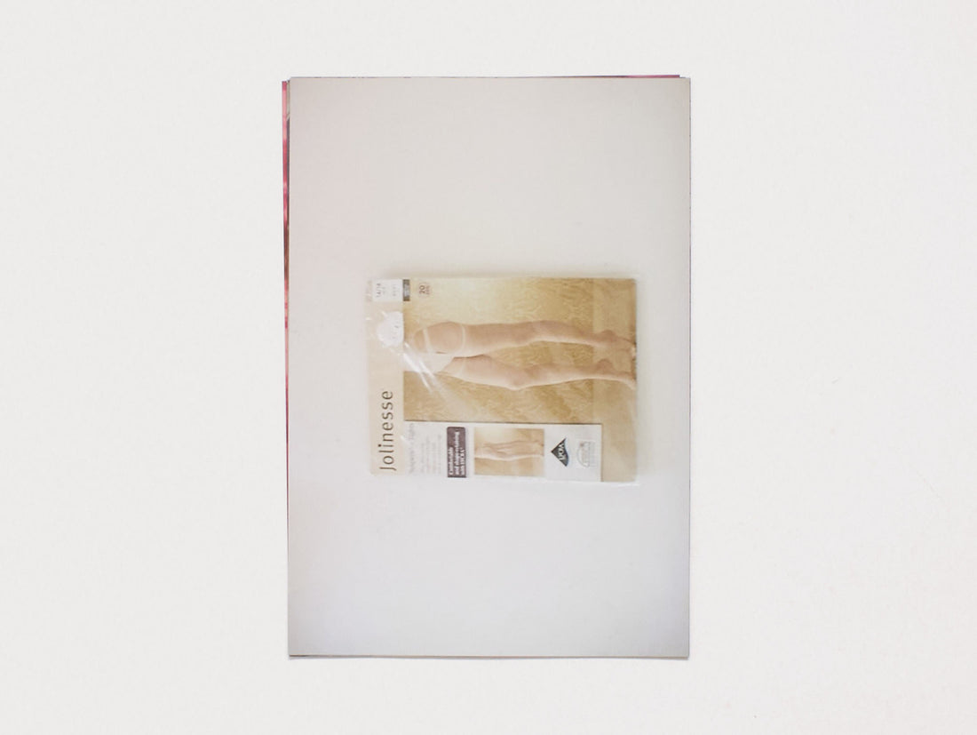 Interior spread from 'Jolinesse' featuring a magazine clipping of legs.