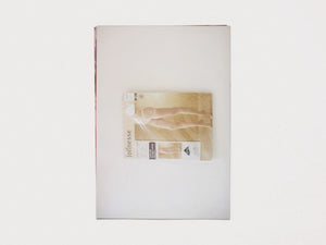 Interior spread from 'Jolinesse' featuring a magazine clipping of legs.