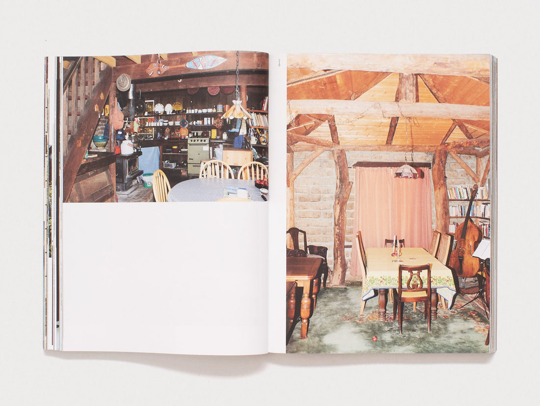 Interior spread showing two photographs of rustic domestic interiors.