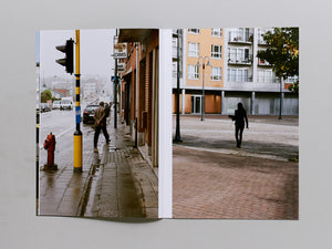 Four Oranges, Some Office Buildings, Woman‚Äôs Legs