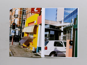 Four Oranges, Some Office Buildings, Woman‚Äôs Legs