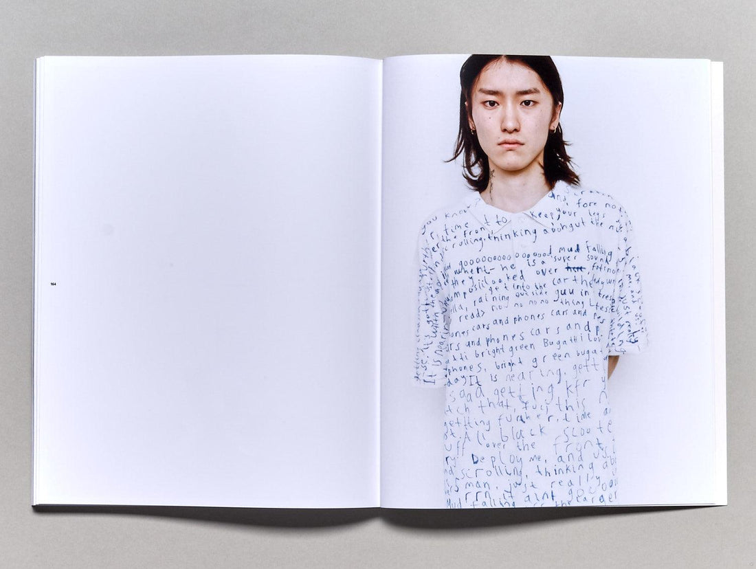 All Black Flexing Tour Bus - Antenne Books